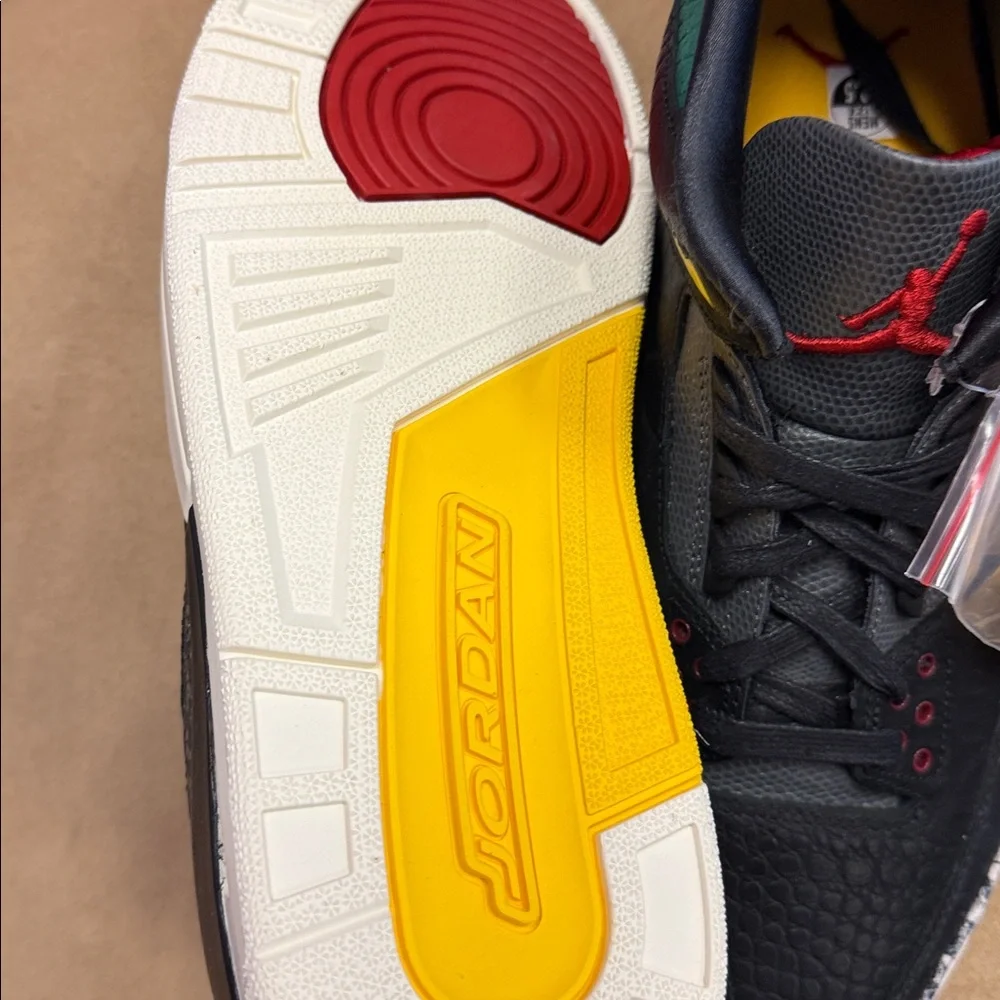 Jordan Low-Top Sneakers in Black with Red, Yellow, and Green Accents